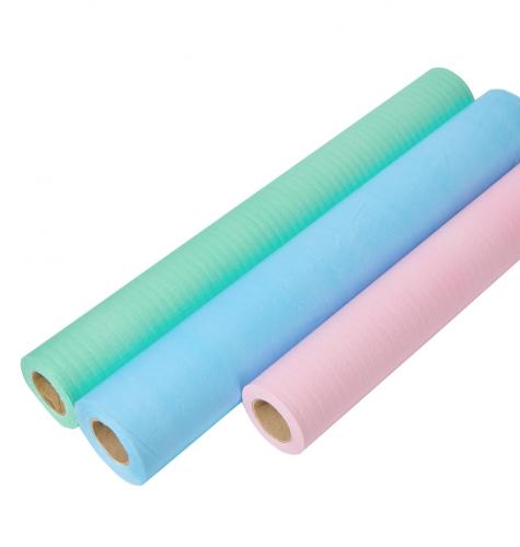 China Laminated Paper Film Roll Degradable Examination Bed Sheet Paper Film Roll Couch/Table Pad Fabricante