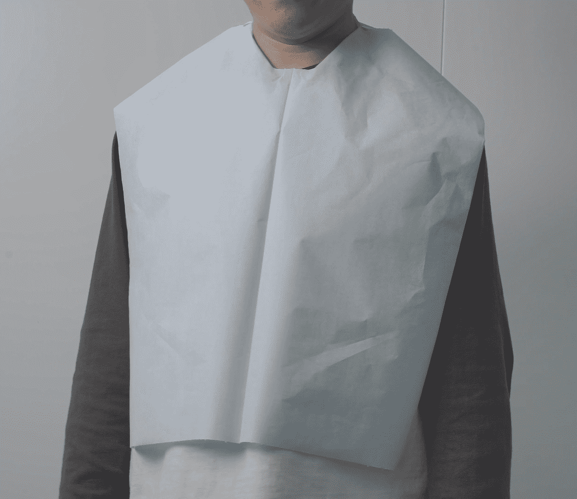 Babadores descartáveis impermeáveis para adultos, para homens e mulheres.